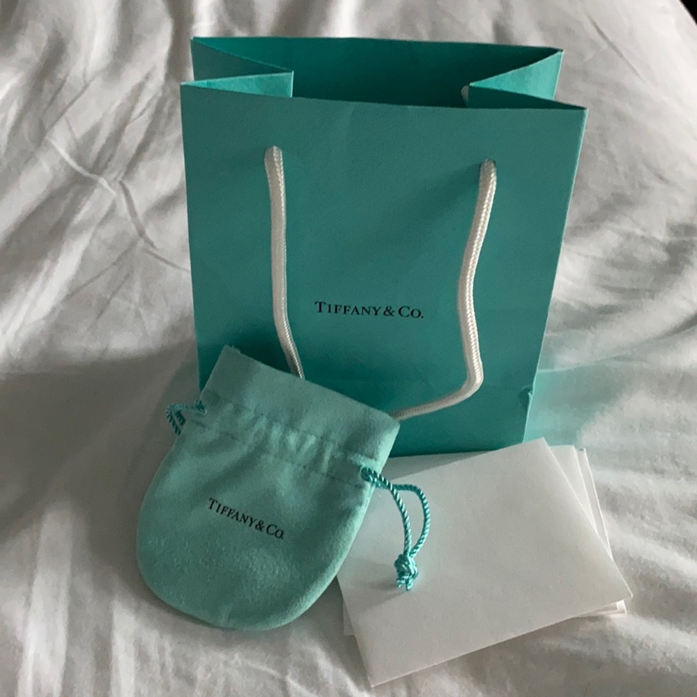 Tiffany’s pouch, bag and envelopes.